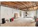Spacious garage with high ceilings and ample storage space at 6702 Sandra Dr, Port Richey, FL 34668