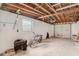 Unfinished garage, offering abundant space for storage and workshop at 6702 Sandra Dr, Port Richey, FL 34668