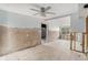 A kitchen in need of renovation, with drywall removed and showing the structure at 6702 Sandra Dr, Port Richey, FL 34668