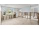 Under-renovation living room with exposed walls and tiled floor at 6702 Sandra Dr, Port Richey, FL 34668