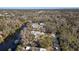 Aerial view of property near a river, with houses nearby at 7226 Alafia Ridge Loop, Riverview, FL 33569