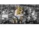 Aerial view of a house and large lot with a detached garage at 7226 Alafia Ridge Loop, Riverview, FL 33569