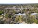 Aerial view of a house with a large yard, located near water at 7226 Alafia Ridge Loop, Riverview, FL 33569