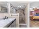 Bathroom boasts a walk-in shower with modern fixtures at 7226 Alafia Ridge Loop, Riverview, FL 33569