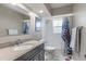 Clean bathroom with granite countertop and bathtub at 7226 Alafia Ridge Loop, Riverview, FL 33569