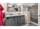 Modern bathroom with double vanity and walk-in shower at 7226 Alafia Ridge Loop, Riverview, FL 33569