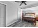 Guest bedroom with wood bed frame and dresser at 7226 Alafia Ridge Loop, Riverview, FL 33569