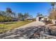 House with boat parked in driveway at 7226 Alafia Ridge Loop, Riverview, FL 33569