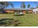 Brick ranch house with large yard at 7226 Alafia Ridge Loop, Riverview, FL 33569