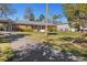 Ranch house with long driveway at 7226 Alafia Ridge Loop, Riverview, FL 33569