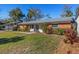 Brick ranch house with side yard at 7226 Alafia Ridge Loop, Riverview, FL 33569