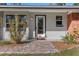 Front entrance with brick walkway at 7226 Alafia Ridge Loop, Riverview, FL 33569