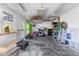 Garage with overhead storage and various tools at 7226 Alafia Ridge Loop, Riverview, FL 33569
