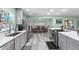 Modern kitchen with gray cabinets and stainless steel appliances at 7226 Alafia Ridge Loop, Riverview, FL 33569