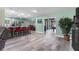 Open floor plan connecting kitchen, dining, and sunroom at 7226 Alafia Ridge Loop, Riverview, FL 33569