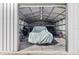 Spacious workshop with covered vehicle and tools at 7226 Alafia Ridge Loop, Riverview, FL 33569