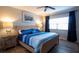 Bright bedroom with a king-size bed and mirrored closet at 880 Mandalay Ave # N102, Clearwater Beach, FL 33767