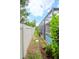 Landscaped backyard with a long, private fence at 1069 River Wind Cir, Bradenton, FL 34212