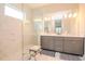 Spa-like bathroom with a large shower and double vanity at 1069 River Wind Cir, Bradenton, FL 34212