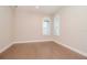 Bright bedroom with hardwood floors and plantation shutters at 1069 River Wind Cir, Bradenton, FL 34212