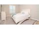 Bedroom with a queen bed, dresser, and window shutters at 1069 River Wind Cir, Bradenton, FL 34212