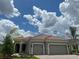 Beautiful two-car garage home with tile roof at 1069 River Wind Cir, Bradenton, FL 34212