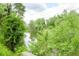 Serene view of a natural waterway, lush greenery at 1069 River Wind Cir, Bradenton, FL 34212