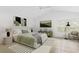 Main bedroom with vaulted ceiling, ceiling fan, and large window at 15890 Sanctuary Dr, Tampa, FL 33647