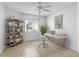 Home office features built-in shelving and a workspace at 15890 Sanctuary Dr, Tampa, FL 33647