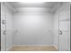 Spacious walk-in closet with wire shelving and hanging rods at 15890 Sanctuary Dr, Tampa, FL 33647