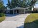 Single-story home with carport and spacious yard at 1632 28Th S Ave, St Petersburg, FL 33712