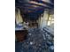 Fire-damaged kitchen with debris and appliances at 1632 28Th S Ave, St Petersburg, FL 33712