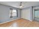 Bedroom with wood floors and ceiling fan at 1702 Horseshoe Dr, Plant City, FL 33566