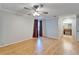 Light and airy bedroom with wood flooring at 1702 Horseshoe Dr, Plant City, FL 33566
