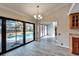 Bright dining room with pool view and tile floor at 1702 Horseshoe Dr, Plant City, FL 33566