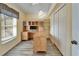 Home office with built-in desk and storage at 1702 Horseshoe Dr, Plant City, FL 33566