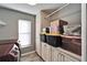 Laundry room with cabinets and storage space at 1702 Horseshoe Dr, Plant City, FL 33566