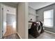 Laundry room with washer, dryer, and access to bedroom at 1702 Horseshoe Dr, Plant City, FL 33566