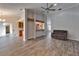 Spacious living room with a fireplace, built-in shelving and view of pool at 1702 Horseshoe Dr, Plant City, FL 33566