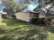 Backyard with fence and grass lawn at 19809 Wyndham Lakes Dr, Odessa, FL 33556