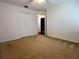 Bedroom with carpet, closet, and ceiling fan at 19809 Wyndham Lakes Dr, Odessa, FL 33556