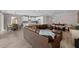 Open floor plan integrating kitchen, dining, and living areas for seamless living at 19891 Bridgetown Loop, Venice, FL 34293