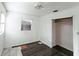 Bright bedroom with wood-look floors and a large closet at 2005 E Crenshaw St, Tampa, FL 33610