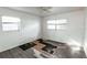 Bright bedroom featuring new wood-look floors and ample natural light at 2005 E Crenshaw St, Tampa, FL 33610