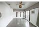Simple bedroom with wood-look floors and a large closet at 2005 E Crenshaw St, Tampa, FL 33610