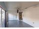 Large bonus room with built-in bookcases and plenty of natural light at 2005 E Crenshaw St, Tampa, FL 33610