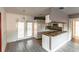 Open kitchen and dining area with French doors at 2005 E Crenshaw St, Tampa, FL 33610