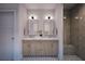 Modern bathroom with double vanity and a walk-in shower at 2550 1St N Ave, St Petersburg, FL 33713