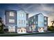 Three-story townhomes with modern design and landscaping at 2550 1St N Ave, St Petersburg, FL 33713