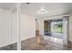 Bright dining area with tiled floors and sliding glass doors to patio at 3403 Overland Dr, Holiday, FL 34691